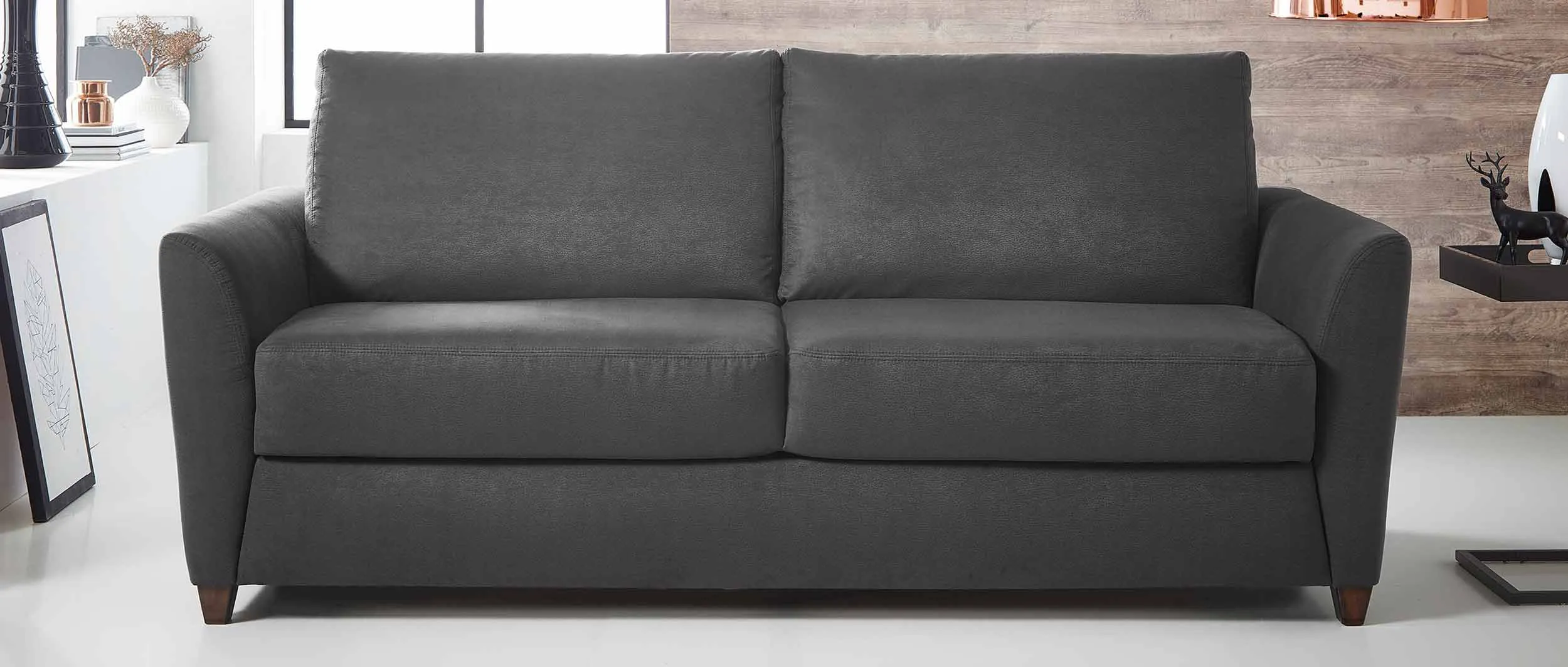 Das HEIDELBERG DELUXE Schlafsofa mit integrierten Holzlattenrost und Matratze