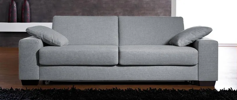 Das AMSTERDAM DELUXE Schlafsofa mit Lattenrost und Matratze - die beiden Seitenkissen können paarweise dazu bestellt werden