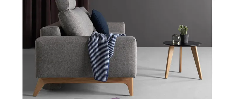 NORDIC mit schwarzer Tischplatte als Beistelltisch zum IDUN Schlafsofa