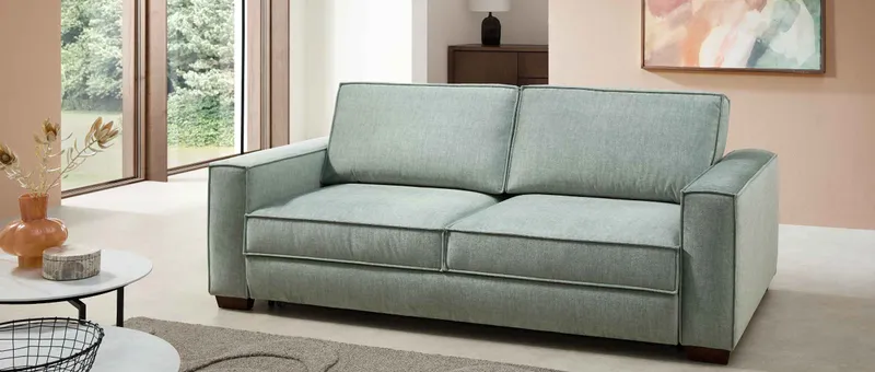 Das KONSTANZ DELUXE Schlafsofa hat eine große Auswahl an Stoffen – hier im Stoff Lima Mint
