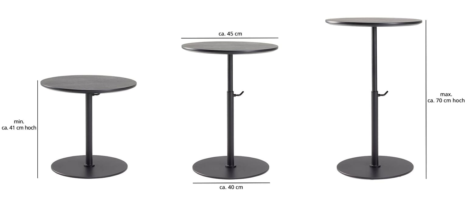 Der Tisch KIFFA von Innovation ist höhenverstellbar. Hier mit schwarz gebeizter Tischplatte aus Eichenholz.